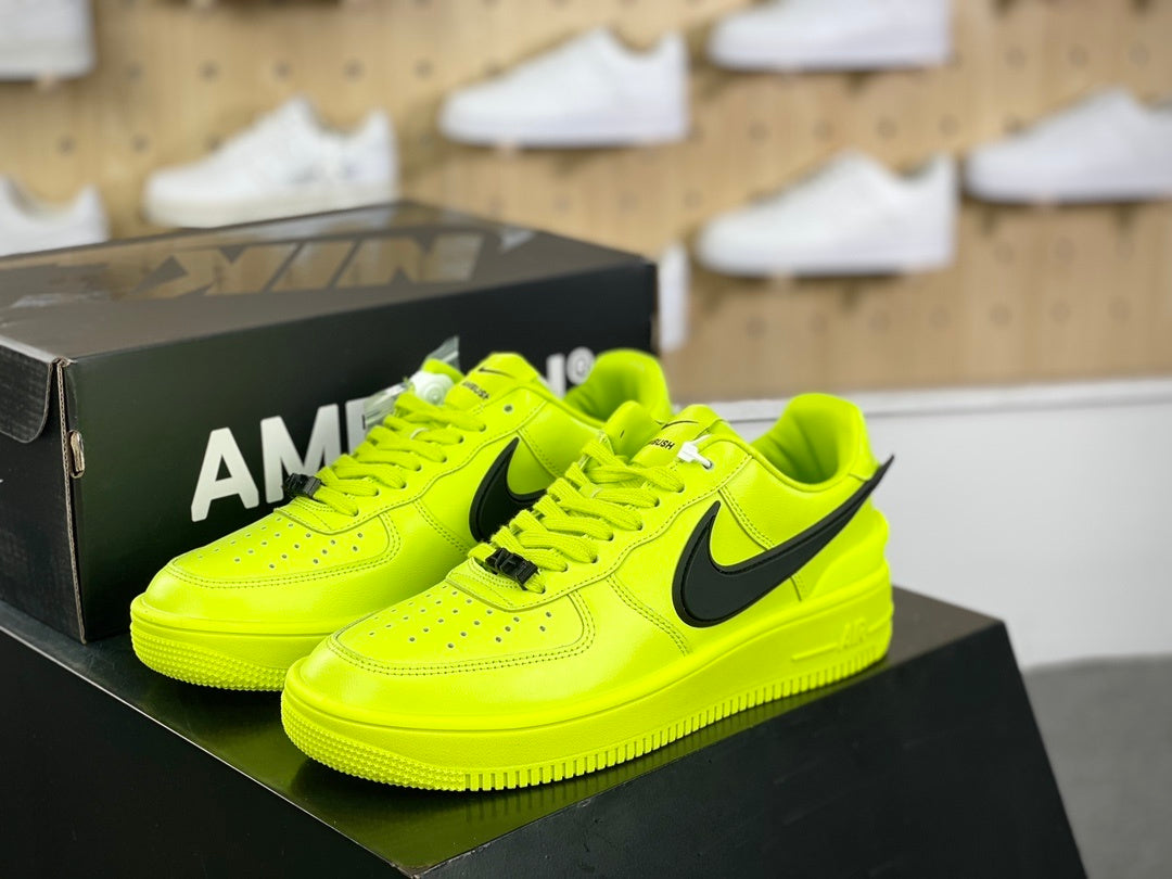 Neon yellow and black low-top sneakers with extended side detail, view 1