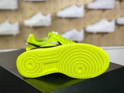 Neon yellow and black low-top sneakers with extended side detail, view 5