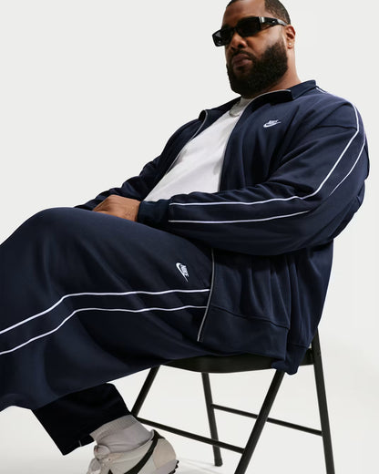 Nike Sportswear Club Oversized track pants made of knitted material (men's)
