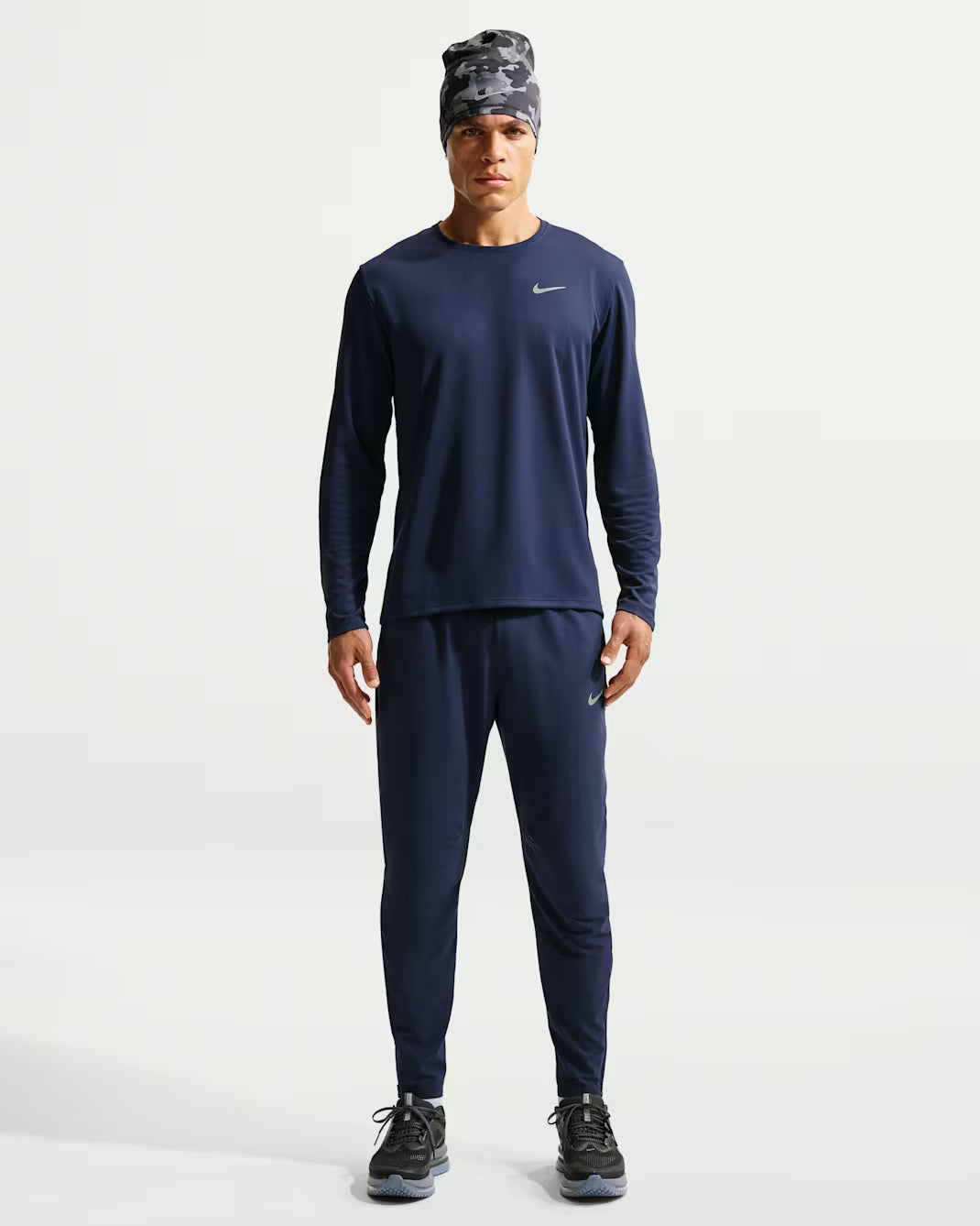 Nike Stride Dri-FIT running pants made of woven material (men's)