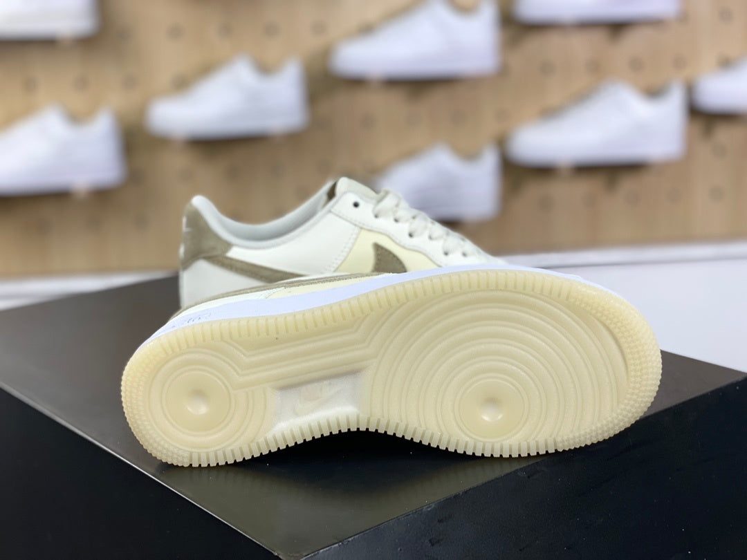 Cream and khaki low-top sneakers with white midsole