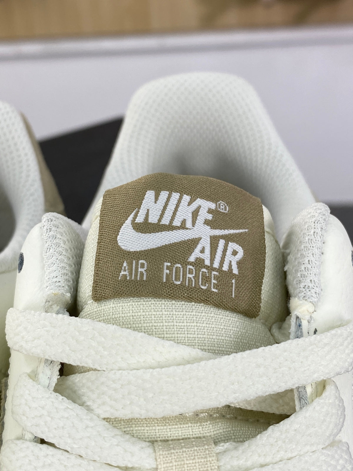 Cream and khaki low-top sneakers with white midsole