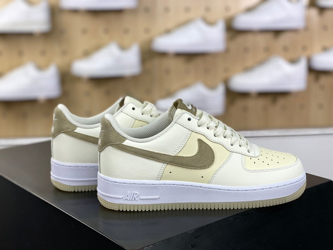 Cream and khaki low-top sneakers side view