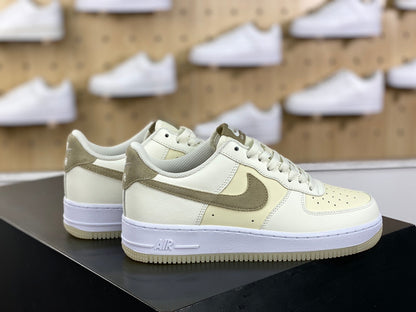 Cream and khaki low-top sneakers side view